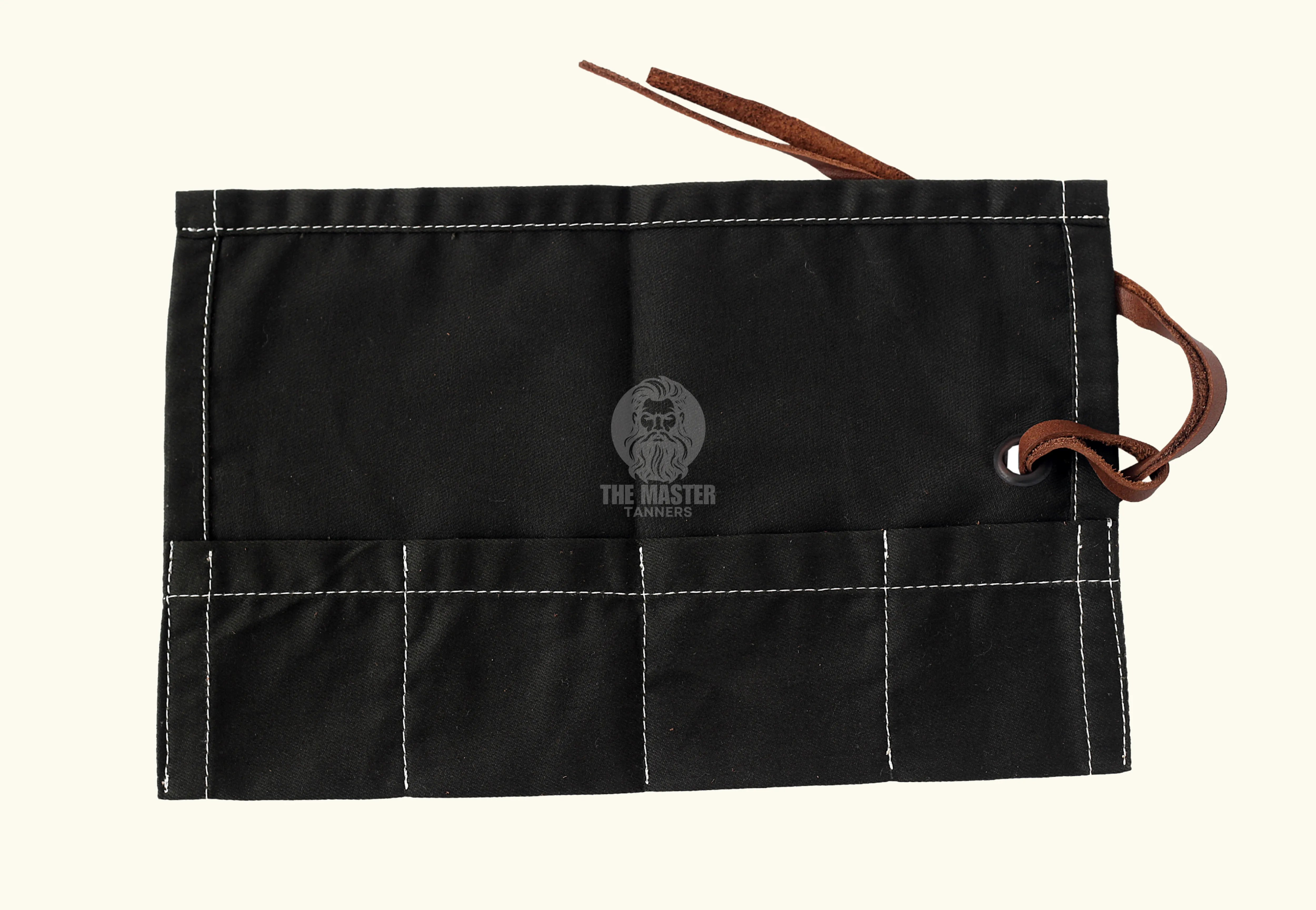 Black canvas tool roll, foldable storage pouch, roll-up tool bag, canvas utility roll, leather strap closure pouch, compact tool organizer, handmade tool holder, artisan tool wrap, canvas pouch with leather tie, heavy-duty canvas tool roll, cotton canvas storage case, durable fabric tool organizer, multi-pocket tool roll, portable tool wrap, hand tool storage pouch, tool kit roll for professionals, brush or tweezer roll case, minimalist tool pouch, rustic style tool roll, black pouch with white stitching,