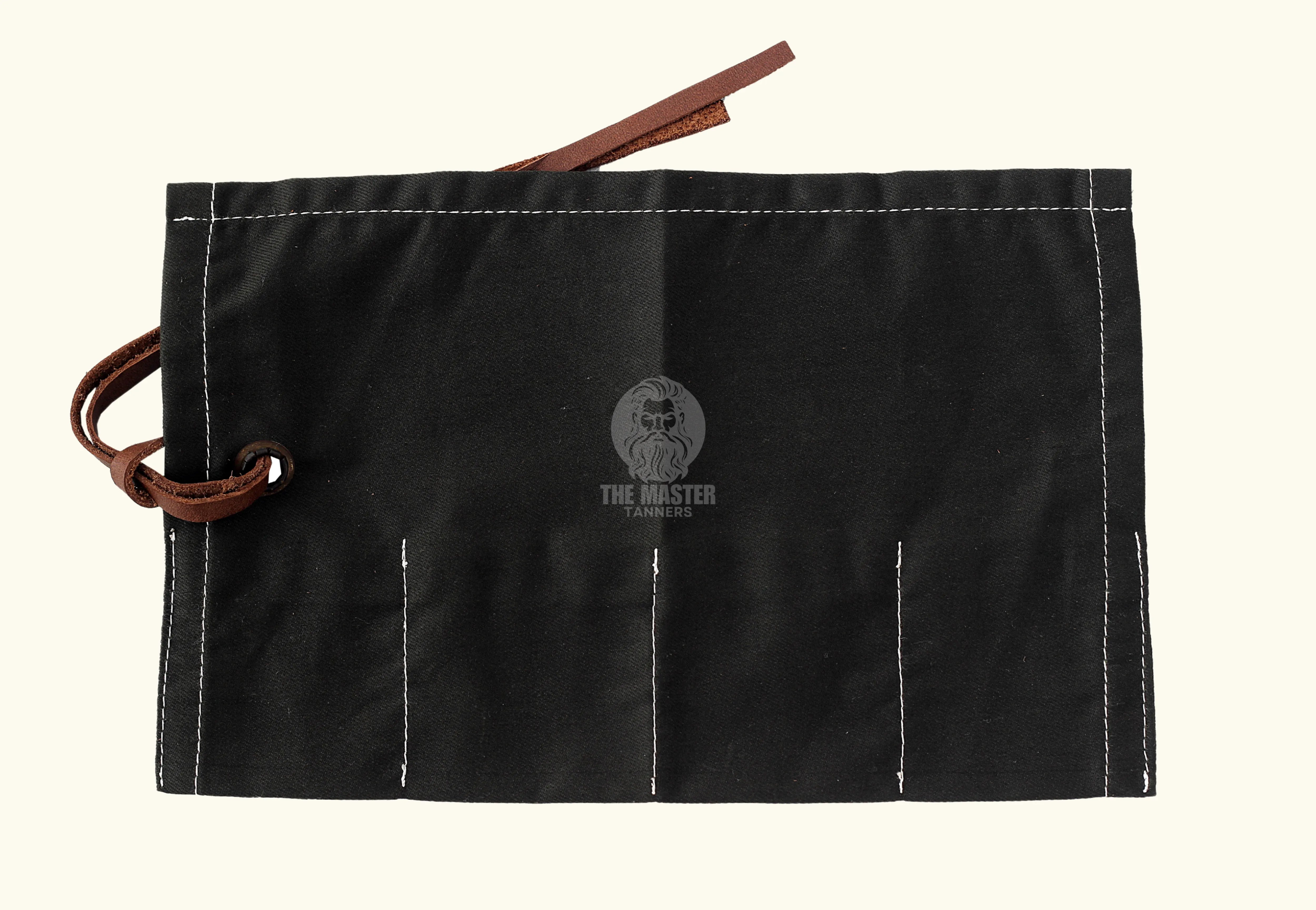 Black canvas tool roll, foldable storage pouch, roll-up tool bag, canvas utility roll, leather strap closure pouch, compact tool organizer, handmade tool holder, artisan tool wrap, canvas pouch with leather tie, heavy-duty canvas tool roll, cotton canvas storage case, durable fabric tool organizer, multi-pocket tool roll, portable tool wrap, hand tool storage pouch, tool kit roll for professionals, brush or tweezer roll case, minimalist tool pouch, rustic style tool roll, black pouch with white stitching,